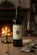 Elegant bottle of Chateau Gabby wine with navy and cream label on a rustic wooden surface